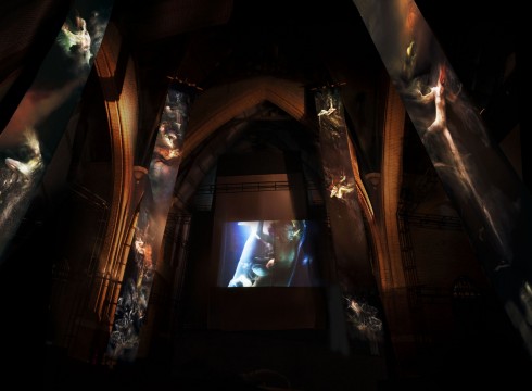 a multi-screen installation alongside paintings on silk